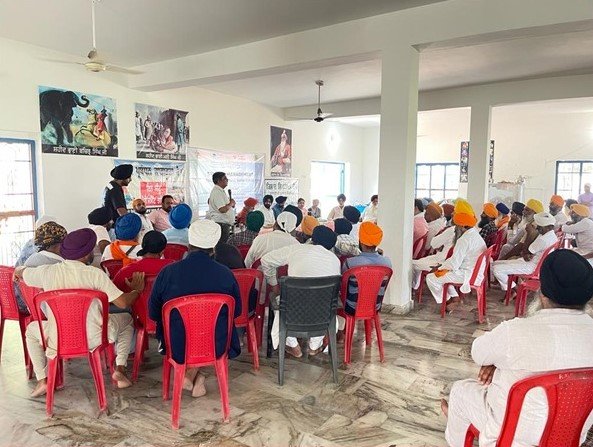 Community Meeting at a Village (2).jpeg