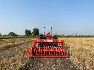 Mulching with Superseeder.JPG