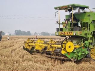 Crop Harvesting with Combine.JPG